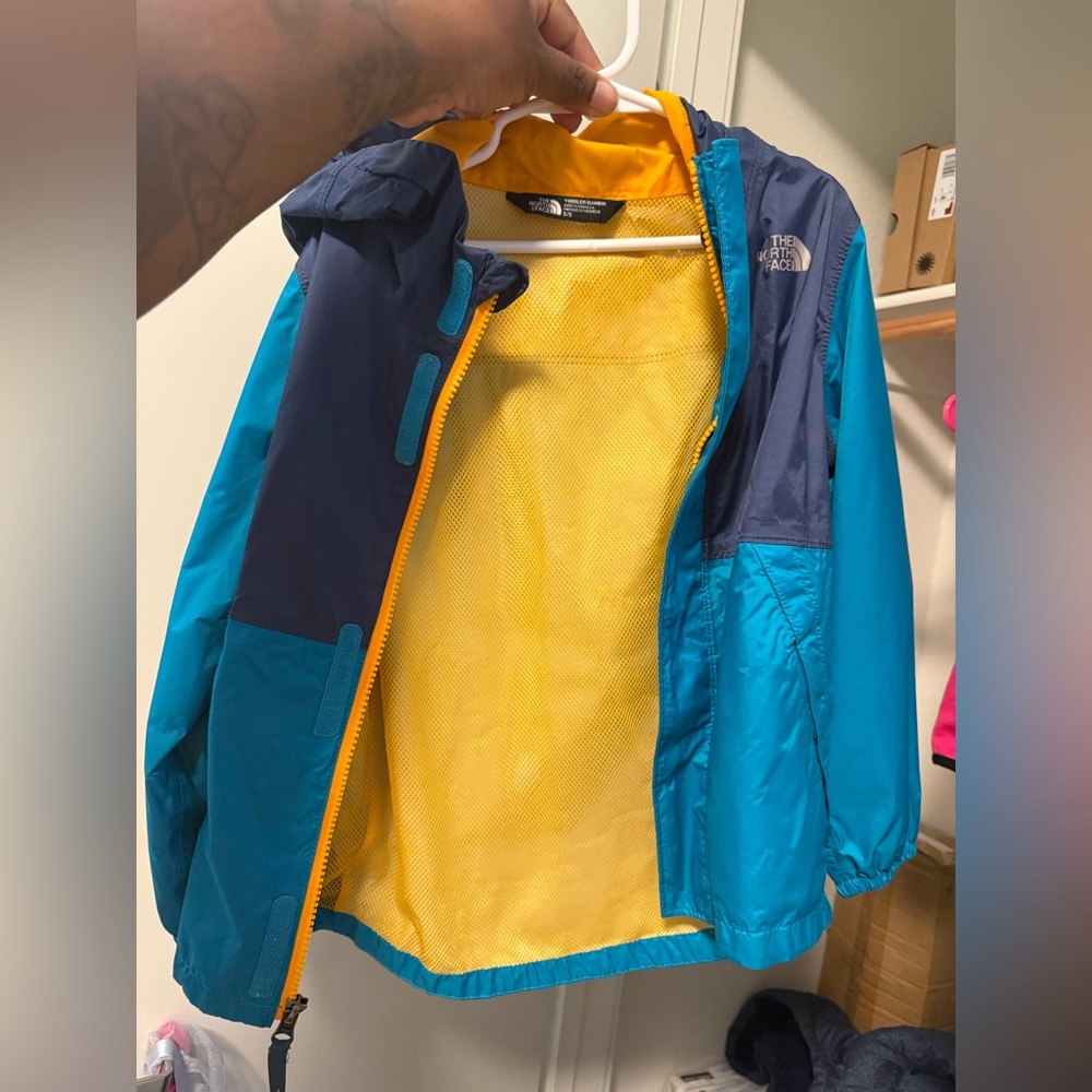 The North Face Blue and Yellow Raincoat Lightweight Water-Resistant
